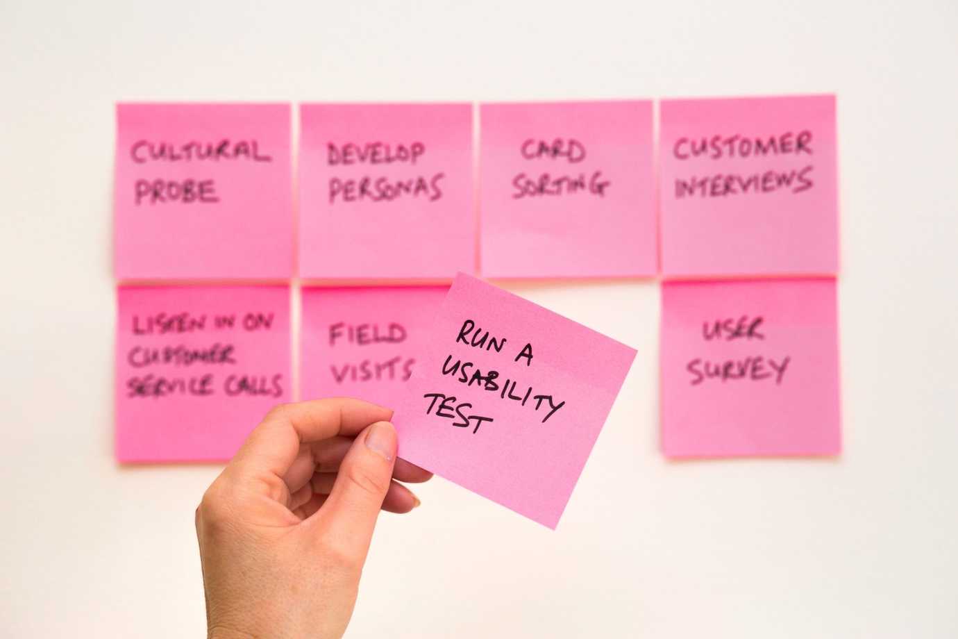 UX tasks on sticky notes, by David Travis found at Unsplash